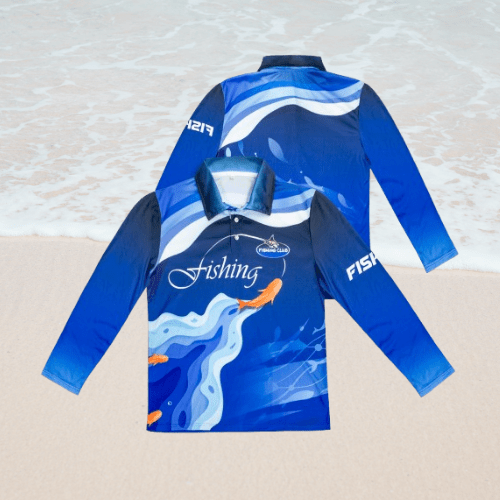 Blue fishing long sleeve shirt, a back and front, and a 'fishing' custom printed text with fish artwork near beach.