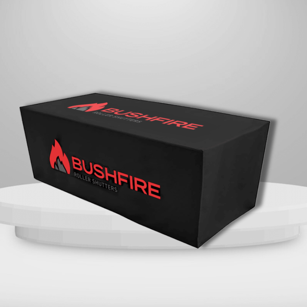 Black tablecloth displays and a 'bushfire roller shutter' logo printed, on a circular table with white background.